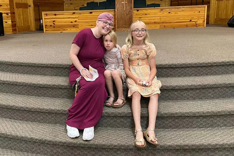 After being diagnosed with cancer, Anna 'Chickadee' Cardwell celebrates her daughter's graduation from elementary school.